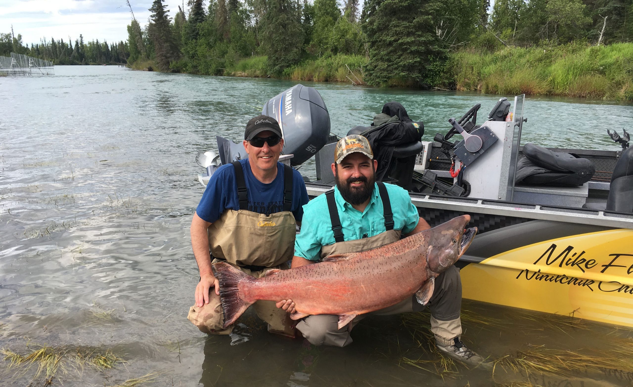 Man holding king salmon in Alaska