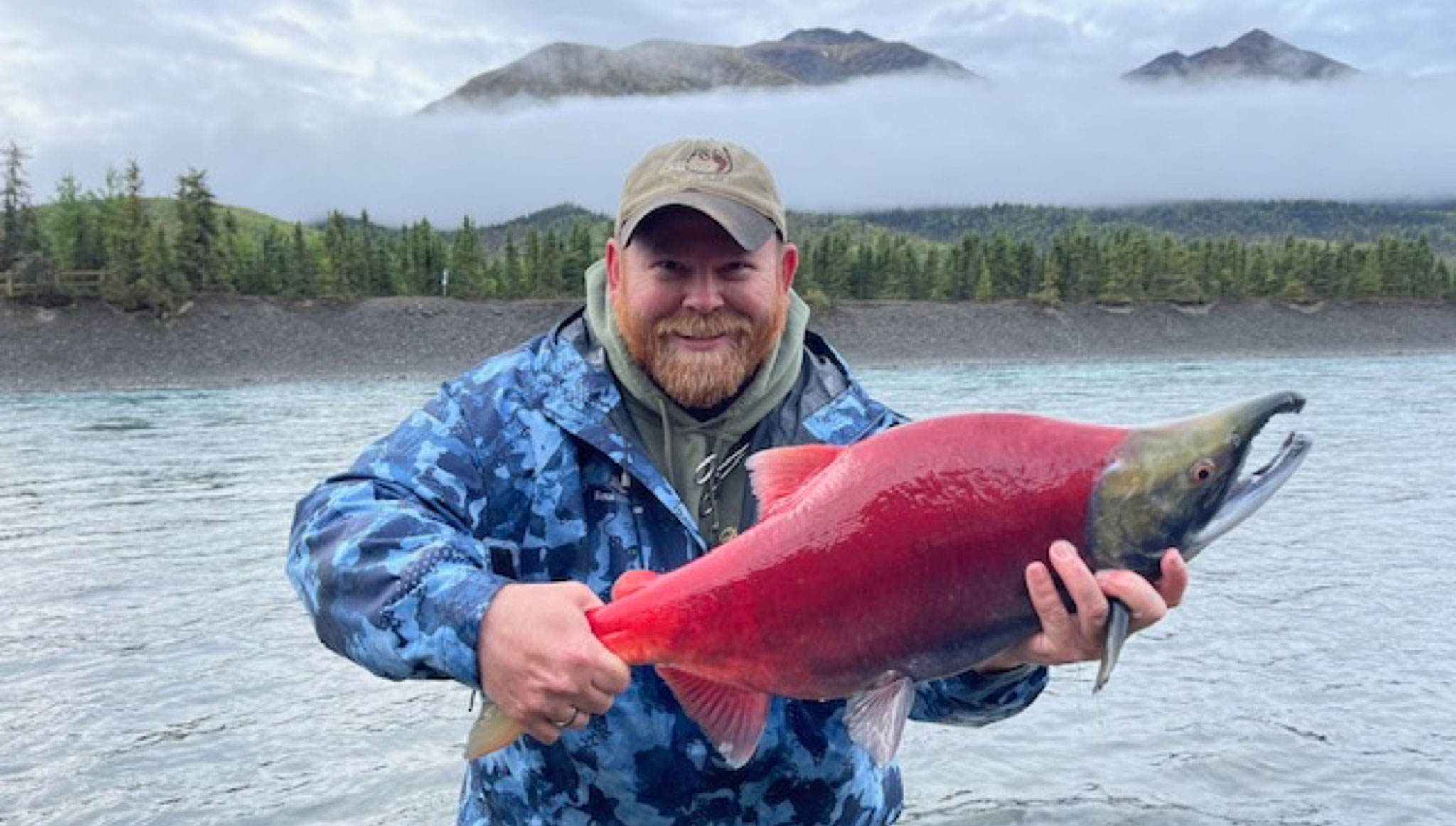 man holding salmon