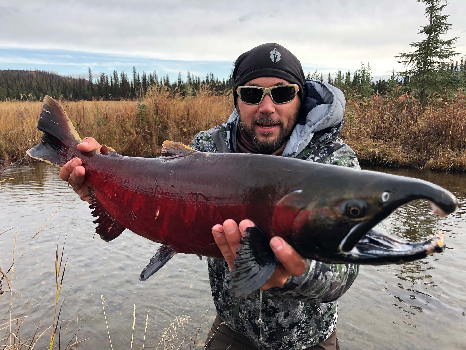 man holding king salmon